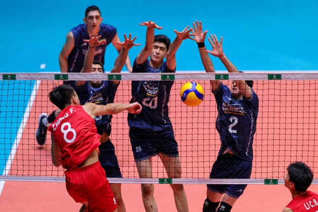 HAIKOU, CHINA - JULY 17: Zhang Fan of Team China attacks the ball while being blocked by an Iranian player during the 2026 Asian U18 Men s Volleyball Championship semifinal match between China and Iran on July 17, 2026 in Haikou, Hainan Province of China. China lost to Iran 2-3 and failed to reach the final.  Copyright: xChinaxNewsxServicex 111654891905