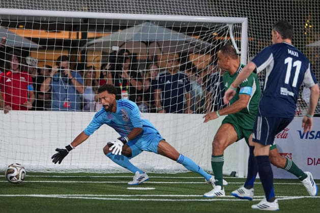 (260718) -- NEW YORK, July 18, 2026 -- Cabo Verde s goalkeeper Vozinha (L) makes a save during a FIFA Legends Cup match held ahead of the final match between Argentina and Spain at the 2026 FIFA World Cup, WM, Weltmeisterschaft, Fussball at Rockefeller Center in New York, the United States, July 17, 2026. ) (SP)U.S.-NEW YORK-FOOTBALL-FIFA WORLD CUP-LEGENDS CUP HuangxZongzhi 