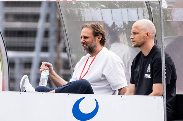 COLOGNE, GERMANY - JULY 18: Tim Steidten (Director Squad Organisation & Recruiting) and Rene Wagner (Head Coach 1. FC Koeln) during pitch check before the first friendly game of season 2026 27 between 1. FC Koeln vs FC Rheinsued Koeln at Suedstadion on July 18, 2026 in Cologne, Germany. North Rhine Westphalia Germany Copyright: xSteffiexWunderlx