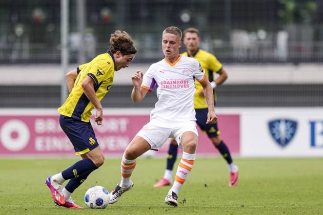 EINDHOVEN , 18-07-2026 , TenCate Stadion De Herdgang , season 2026 2027 , pre season , football , friendly match between PSV and Royale Union Saint-Gilloise picture shows Royale Union Saint-Gilloise player Guilherme Da Silva Carvalho and PSV Player Joey Veerman PSV - Royale Union Saint-Gilloise (friendly)  x205085694x Copyright: