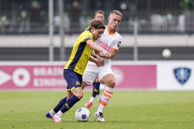 EINDHOVEN , 18-07-2026 , TenCate Stadion De Herdgang , season 2026 2027 , pre season , football , friendly match between PSV and Royale Union Saint-Gilloise picture shows Royale Union Saint-Gilloise player Guilherme Da Silva Carvalho and PSV Player Joey Veerman PSV - Royale Union Saint-Gilloise (friendly)  x205085696x Copyright: