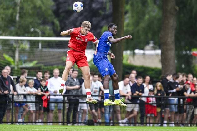 Twente s Ruud Nijstad and Gent s Hyllarion Goore pictured in action during a friendly game between KAA Gent and Dutch FC Twente, at the summer training camp of Belgian first division soccer team KAA Gent in De Lutte, Losser, the Netherlands on Saturday 18 July 2026, to prepare for the upcoming 2026-2027 season. TOM GOYVAERTS TomxGoyvaerts  x181410227x