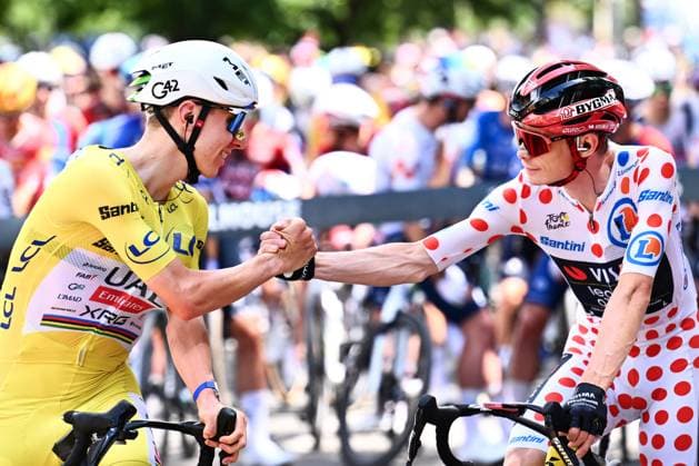 Slovenian Tadej Pogacar of UAE Team Emirates XRG and Danish Jonas Vingegaard of Team Visma-Lease a Bike are pictured before stage 14 of the 2026 Tour de France cycling race, a stage of 155km from Mulhouse to Le Markstein Fellering, on Saturday 18 July 2026. The 113th edition of the Tour de France starts on Saturday 4 July in Barcelona, Spain, and will finish in Paris, France on the 26th of July. POOLxGREGORYxVANxGANSEN  x181411956x
