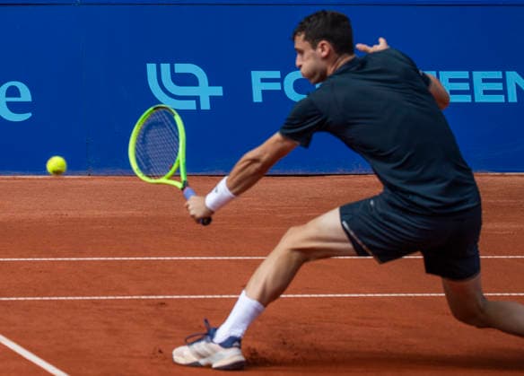 July 18, 2026, Gstaad, Bern, Switzerland: Gstaad Switzerland, 07 18 2026: JUAN MANUEL CERUNDOLO of Argentina is in action during semi-finals of EFG Swiss Open Gstaad ATP, Tennis Herren 250,Tennis Herren 250, which is known as the Swiss Gstaad Open and took place at Roy Emerson Arena in Gstaad, which is located in the famous ski resort of Gstaad and which is located in the Bernese Oberland..RAPHAEL COLLIGNON won 1-7; 7-6; 7-5. Gstaad Switzerland - ZUMAd206 20260718_zip_d206_009 Copyright: xEricxDubostx