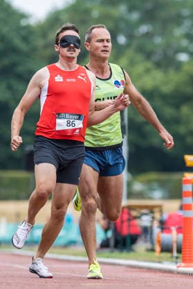 LEVERKUSEN, GERMANY - JULY 18, 2026 : Marcel Boettger (GER LG Olympia Dortmund) and his guide Alexander Kosenkow competing in the 100m during the Para Heimspiel 7.0 at Fritz Jacobi Sports Complex on July 18, 2026 in Leverkusen, Germany. Northrhine-Westphalia Germany Copyright: xAxelxKohringx
