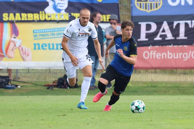 18.07.2026, xrekx, Fussball Testspiel, SV Sandhausen - 1. FC Saarbruecken v.l. Phil Halbauer (SV Sandhausen) Daniel Gleiber (1. FC Saarbruecken) (DFL DFB REGULATIONS PROHIBIT ANY USE OF PHOTOGRAPHS as IMAGE SEQUENCES and or QUASI-VIDEO) Lautenbach *** July 18, 2026, xrekx, soccer friendly match, SV Sandhausen vs. 1. FC Saarbrücken, photo by Phil Halbauer, SV Sandhausen, Daniel Gleiber, 1. FC Saarbrücken. DFL and DFB regulations prohibit any use of photographs as image sequences and or quasi-video. Lautenbach