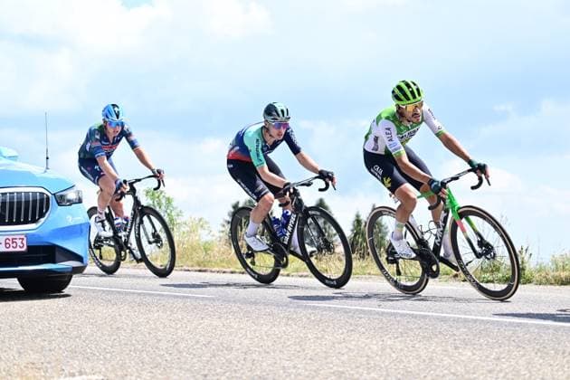 Tour de France 2026 Stage 14 LE MARKSTEIN, FRANCE - JULY 18 : Oldani Stefano (ITA) of Caja Rural - Seguros RGA and Merlier Tim (BEL) of Soudal Quick Step in action during stage 14 of the 113rd edition of Tour de France an UCI World Tour 2.UWT cycling road race stage for Men Elite of 155 km with start in Mulhouse and finish in Le Markstein on July 18, 2026 in Le Markstein, France, 18 07 2026 ( Motordriver Kurt Vandenborre - Le Markstein France  Copyright: xPeterxDexVoechtx