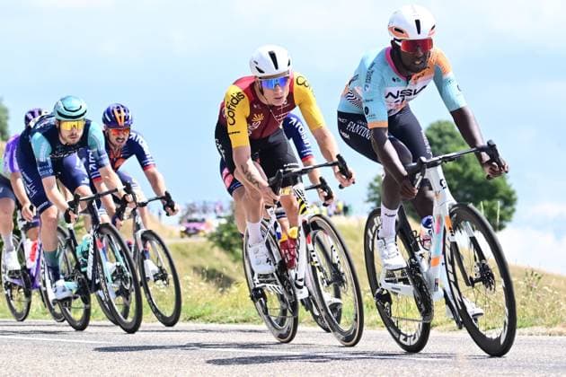 Tour de France 2026 Stage 14 LE MARKSTEIN, FRANCE - JULY 18 : Page Hugo (FRA) of Cofidis, Girmay Biniam (ERI) of NSN Cycling Team in action during stage 14 of the 113rd edition of Tour de France an UCI World Tour 2.UWT cycling road race stage for Men Elite of 155 km with start in Mulhouse and finish in Le Markstein on July 18, 2026 in Le Markstein, France, 18 07 2026 ( Motordriver Kurt Vandenborre - Le Markstein France  Copyright: xPeterxDexVoechtx