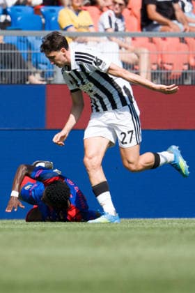 BASEL, SWITZERLAND - JULY 18: Philip Otele of Basel L) battles for the ball with Andrea Cambiaso of Juventus R) during the pre-season friendly match between FC Basel 1893 and Juventus at St. Jakob Stadium on July 18, 2026 in Basel, Switzerland. *** BASEL, SWITZERLAND, JULY 18 — Philip Otele of Basel (L) battles for the ball with Andrea Cambiaso of Juventus (R) during the preseason friendly match between FC Basel 1893 and Juventus at St. Jakob Stadium on July 18, 2026, in Basel, Switzerland Copyright: xJustPictures.ch PascalxvonxBürenx jp-en-EuSpIm-Pavo_Fotografie-05437
