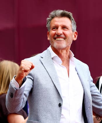 Sebastian Coe celebrates Josh Kerr of Great Britain winning the Mens 1 mile to set a new World record with a time of 3:42.66. The London Athletics Meet, Wanda Diamond League, London Stadium, London, UK - 18 Jul 2026London London Stadium United Kingdom  Copyright: xJamesxMarsh Shutterstockx 16996766cj