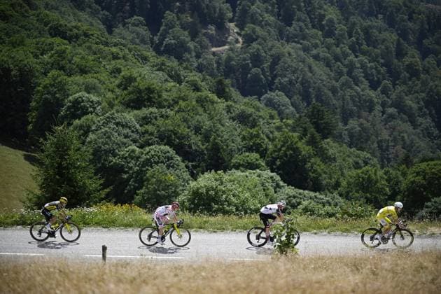 Danish Jonas Vingegaard of Team Visma-Lease a Bike and Slovenian Tadej Pogacar of UAE Team Emirates XRG are pictured during stage 14 of the 2026 Tour de France cycling race, a stage of 155km from Mulhouse to Le Markstein Fellering, on Saturday 18 July 2026. The 113th edition of the Tour de France starts on Saturday 4 July in Barcelona, Spain, and will finish in Paris, France on the 26th of July. JASPERxJACOBS  x181422339x