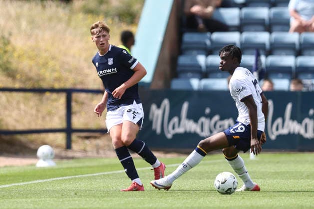 RECORD DATE NOT STATED 18th July 2026; Dens Park, Dundee, Scotland; Friendly Football, Dundee versus Everton; Charley Oosenbrugh of Dundee hits a pass while Tyrique George of Everton tries to close him down DavidxYoung