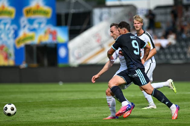 SOCCER - Altach vs Grasshoppers, test match ALTACH,AUSTRIA,18.JUL.26 - SOCCER - ADMIRAL Bundesliga, Super League, SCR Altach vs Grasshopper Club Zuerich, test match. Image shows Mike Baehre (Altach), Nikolas Muci (Grashoppers) and Filip Milojevic (Altach).  GEPAxpictures xOliverxLerch