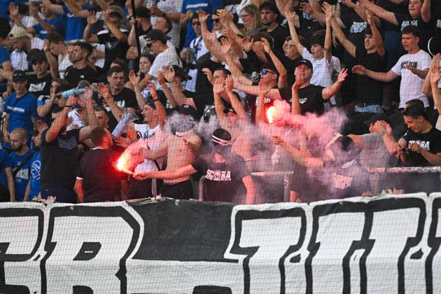 SOCCER - Altach vs Grasshoppers, test match ALTACH,AUSTRIA,18.JUL.26 - SOCCER - ADMIRAL Bundesliga, Super League, SCR Altach vs Grasshopper Club Zuerich, test match. Image shows fans of Altach and Grashoppers with bengal firework.  GEPAxpictures xOliverxLerch