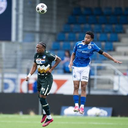 EINDHOVEN , 18-07-2026 , Jan Louwers Stadium , pre season 2026 2027 , Dutch Keukenkampioen divisie , football , match between FC Eindhoven and FC Den Bosch, picture shows FC Den Bosch player Genrich Sille FC Eindhoven player Tyrese Simons Eindhoven - Den Bosch (friendly)  x205090328x Copyright: