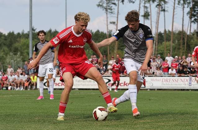 18.07.2026 - Fussball - Saison 2026 2027 - Testspiel Freundschaftsspiel Vorbereitungsspiel: 1. FC Nürnberg Nuernberg FCN ( Club ) - SV Waldhof Mannheim 07 - Sportfoto Zink DaMa - xdaxmax - Piet Scobel (19, 1. FC Nürnberg FCN ) Moritz Malik Polte (3, SV Waldhof Mannheim 07 SVW07 ) *** July 18, 2026 Soccer Season 2026–2027 Exhibition Match Friendly Match Preseason Match 1 FC Nürnberg (Nuremberg) FCN Club SV Waldhof Mannheim 07 Sports Photo Zink DaMa xdaxmax Piet Scobel 19, 1 FC Nuremberg FCN Moritz Malik Polte 3, SV Waldhof Mannheim 07 SVW07
