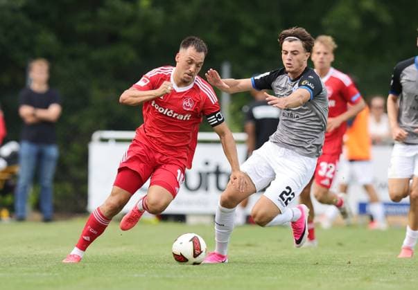18.07.2026 - Fussball - Saison 2026 2027 - Testspiel Freundschaftsspiel Vorbereitungsspiel: 1. FC Nürnberg Nuernberg FCN ( Club ) - SV Waldhof Mannheim 07 - Sportfoto Zink DaMa - xdaxmax - Julian Justvan (10, 1. FC Nürnberg FCN ) Denis Kryeziu (22, SV Waldhof Mannheim 07 SVW07 ) *** July 18, 2026 Soccer Season 2026–2027 Exhibition Match Friendly Match Preseason Match 1 FC Nürnberg (Nuremberg) FCN Club SV Waldhof Mannheim 07 Sports Photo Zink DaMa xdaxmax Julian Justvan 10, 1 FC Nuremberg FCN Denis Kryeziu 22, SV Waldhof Mannheim 07 SVW07