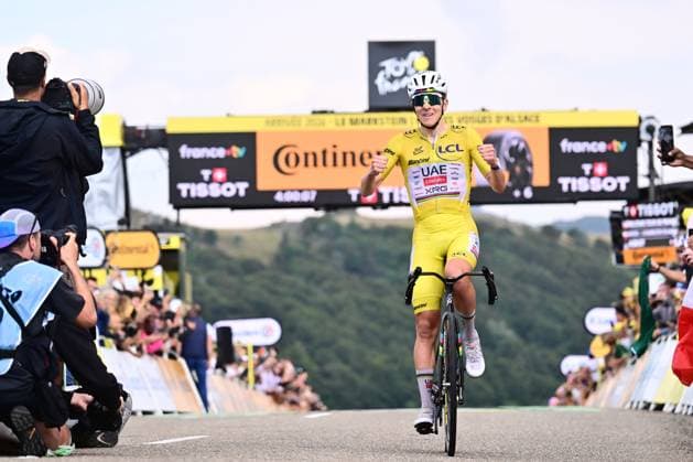 Tour de France 2026 Stage 14 LE MARKSTEIN, FRANCE - JULY 18 : Pogacar Tadej (SLO) of UAE Team Emirates XRG celebrating his victory during stage 14 of the 113rd edition of Tour de France an UCI World Tour 2.UWT cycling road race stage for Men Elite of 155 km with start in Mulhouse and finish in Le Markstein on July 18, 2026 in Le Markstein, France, 18 07 2026 ( Motordriver Kurt Vandenborre - Le Markstein France  Copyright: xPeterxDexVoechtx