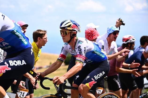 Tour de France 2026 Stage 14 LE MARKSTEIN, FRANCE - JULY 18 : Evenepoel Remco (BEL) of Red Bull - BORA - Hansgrohe in action during stage 14 of the 113rd edition of Tour de France an UCI World Tour 2.UWT cycling road race stage for Men Elite of 155 km with start in Mulhouse and finish in Le Markstein on July 18, 2026 in Le Markstein, France, 18 07 2026 ( Motordriver Kurt Vandenborre - Le Markstein France  Copyright: xGvgx