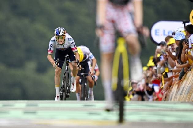 Belgian Remco Evenepoel of Red Bull-BORA-hansgrohe crosses the finish line of stage 14 of the 2026 Tour de France cycling race, a stage of 155km from Mulhouse to Le Markstein Fellering, on Saturday 18 July 2026. The 113th edition of the Tour de France starts on Saturday 4 July in Barcelona, Spain, and will finish in Paris, France on the 26th of July. JASPERxJACOBS  x181425951x