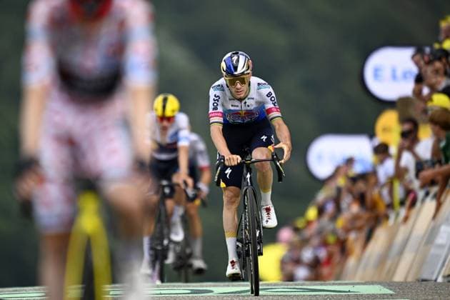 Belgian Remco Evenepoel of Red Bull-BORA-hansgrohe crosses the finish line of stage 14 of the 2026 Tour de France cycling race, a stage of 155km from Mulhouse to Le Markstein Fellering, on Saturday 18 July 2026. The 113th edition of the Tour de France starts on Saturday 4 July in Barcelona, Spain, and will finish in Paris, France on the 26th of July. JASPERxJACOBS  x181425983x