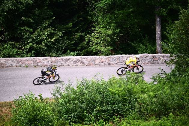 Tour de France 2026 Stage 14 LE MARKSTEIN, FRANCE - JULY 18 : Pogacar Tadej (SLO) of UAE Team Emirates XRG and Jorgenson Matteo (USA) of Team Visma Lease a Bike in action during stage 14 of the 113rd edition of Tour de France an UCI World Tour 2.UWT cycling road race stage for Men Elite of 155 km with start in Mulhouse and finish in Le Markstein on July 18, 2026 in Le Markstein, France, 18 07 2026 ( Motordriver Kurt Vandenborre - Le Markstein France  Copyright: xGvgx