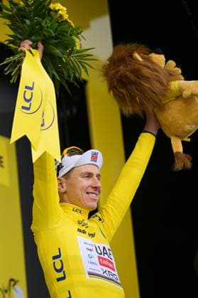 Slovenian Tadej Pogacar of UAE Team Emirates XRG celebrates on the podium after winning stage 14 of the 2026 Tour de France cycling race, a stage of 155km from Mulhouse to Le Markstein Fellering, on Saturday 18 July 2026. The 113th edition of the Tour de France starts on Saturday 4 July in Barcelona, Spain, and will finish in Paris, France on the 26th of July. DAVIDxPINTENS  x181427749x