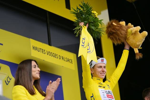 Slovenian Tadej Pogacar of UAE Team Emirates XRG celebrates on the podium after winning stage 14 of the 2026 Tour de France cycling race, a stage of 155km from Mulhouse to Le Markstein Fellering, on Saturday 18 July 2026. The 113th edition of the Tour de France starts on Saturday 4 July in Barcelona, Spain, and will finish in Paris, France on the 26th of July. DAVIDxPINTENS  x181427755x