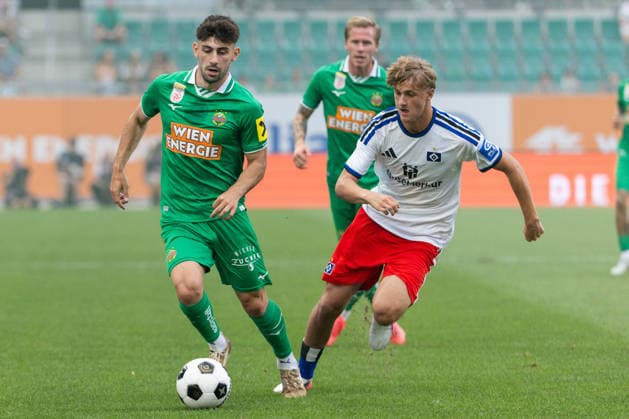 SOCCER - Rapid vs HSV, test match VIENNA,AUSTRIA,18.JUL.26 - SOCCER - ADMIRAL Bundesliga, 1. DFL, 1. Deutsche Bundesliga, SK Rapid Wien vs Hamburger SV, test match. Image shows Yusuf Demir (Rapid) and Louis Lemke (HSV).  GEPAxpictures xPhilippxBrem