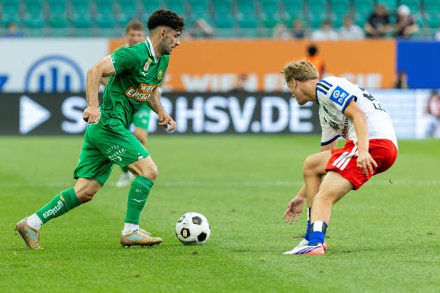 SOCCER - Rapid vs HSV, test match VIENNA,AUSTRIA,18.JUL.26 - SOCCER - ADMIRAL Bundesliga, 1. DFL, 1. Deutsche Bundesliga, SK Rapid Wien vs Hamburger SV, test match. Image shows Yusuf Demir (Rapid) and Louis Lemke (HSV).  GEPAxpictures xPhilippxBrem