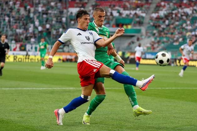 18.July.2026 – SOCCER – FRIENDLY TEST GAME(MEN) - Rapid Wien (Austria) vs HSV (Germany) Nenad Cvetkovic (Rapid Wien) in one-on-one VIENNA VIENNA, AUSTRIA – Allianz Stadion SK Rapid Wien Allianz Stadion AUSTRIA