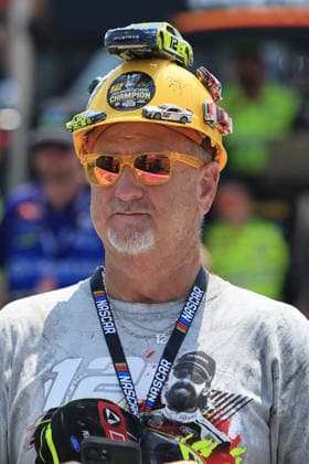 NORTH WILKESBORO, NC - JULY 18: A race fan wears a special hat on pit road prior to the running of the NASCAR, Motorsport, USA Craftsman Truck Series FaithFest 250 on July 18, 2026 at North Wilkesboro Speedway in North Wilkesboro, NC. (Photo by Jeff Robinson Icon Sportswire) AUTO: JUL 18 NASCAR CRAFTSMAN Truck Series Faith Fest 250 EDITORIAL USE ONLY Icon26071823638250