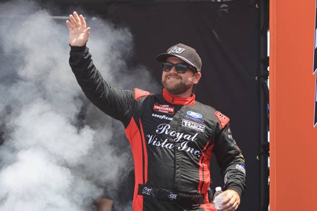 NORTH WILKESBORO, NC - JULY 18: Clayton Green ( 22 Reaume Brothers Racing Badass Workbench Ford) waves to the fans prior to the running of the NASCAR, Motorsport, USA Craftsman Truck Series FaithFest 250 on July 18, 2026 at North Wilkesboro Speedway in North Wilkesboro, NC. (Photo by Jeff Robinson Icon Sportswire) AUTO: JUL 18 NASCAR CRAFTSMAN Truck Series Faith Fest 250 EDITORIAL USE ONLY Icon26071823673250