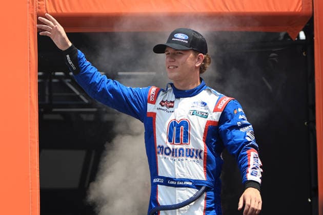 NORTH WILKESBORO, NC - JULY 18: Luke Baldwin ( 2 Reaume Brothers Racing Mohawk Northeast Inc. Ford) waves to the fans prior to the running of the NASCAR, Motorsport, USA Craftsman Truck Series FaithFest 250 on July 18, 2026 at North Wilkesboro Speedway in North Wilkesboro, NC. (Photo by Jeff Robinson Icon Sportswire) AUTO: JUL 18 NASCAR CRAFTSMAN Truck Series Faith Fest 250 EDITORIAL USE ONLY Icon26071823783250