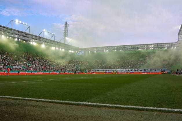 18.July.2026 – SOCCER – FRIENDLY TEST GAME(MEN) - Rapid Wien (Austria) vs HSV (Germany) General view of the stadium before kickoff with green and white flares in the stands. VIENNA VIENNA, AUSTRIA – Allianz Stadion SK Rapid Wien Allianz Stadion AUSTRIA