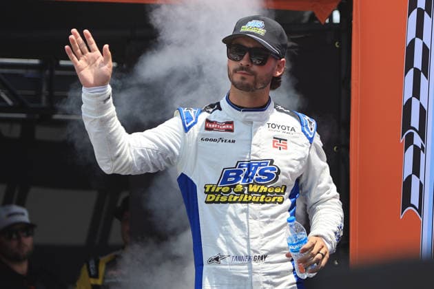 NORTH WILKESBORO, NC - JULY 18: Tanner Gray ( 15 TRICON Garage Down East Heating & Air Black s Tires Toyota) waves to the fans prior to the running of the NASCAR, Motorsport, USA Craftsman Truck Series FaithFest 250 on July 18, 2026 at North Wilkesboro Speedway in North Wilkesboro, NC. (Photo by Jeff Robinson Icon Sportswire) AUTO: JUL 18 NASCAR CRAFTSMAN Truck Series Faith Fest 250 EDITORIAL USE ONLY Icon26071824152250