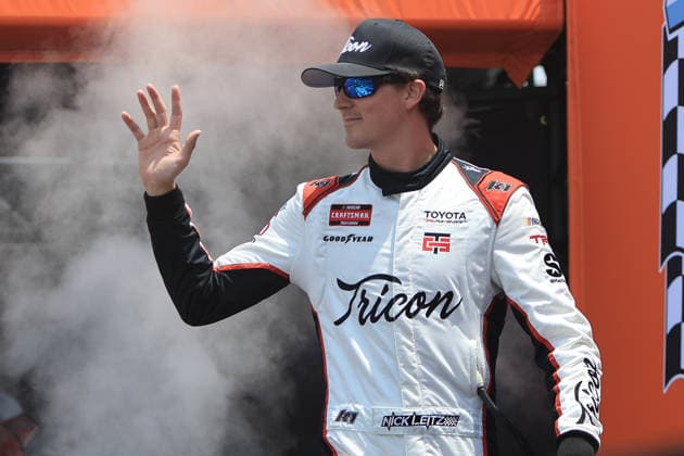 NORTH WILKESBORO, NC - JULY 18: Nick Leitz ( 1 TRICON Garage ShopTricongarage.com Toyota) waves to the fans prior to the running of the NASCAR, Motorsport, USA Craftsman Truck Series FaithFest 250 on July 18, 2026 at North Wilkesboro Speedway in North Wilkesboro, NC. (Photo by Jeff Robinson Icon Sportswire) AUTO: JUL 18 NASCAR CRAFTSMAN Truck Series Faith Fest 250 EDITORIAL USE ONLY Icon26071824204250