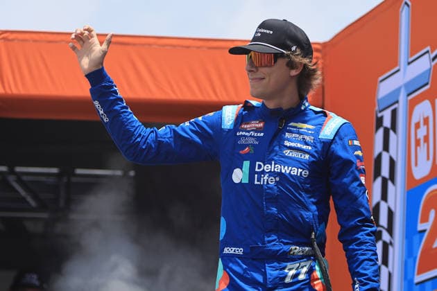 NORTH WILKESBORO, NC - JULY 18: Carson Hocevar ( 77 Spire Motorsports Delaware Life Chevrolet) waves to the fans prior to the running of the NASCAR, Motorsport, USA Craftsman Truck Series FaithFest 250 on July 18, 2026 at North Wilkesboro Speedway in North Wilkesboro, NC. (Photo by Jeff Robinson Icon Sportswire) AUTO: JUL 18 NASCAR CRAFTSMAN Truck Series Faith Fest 250 EDITORIAL USE ONLY Icon26071824507250