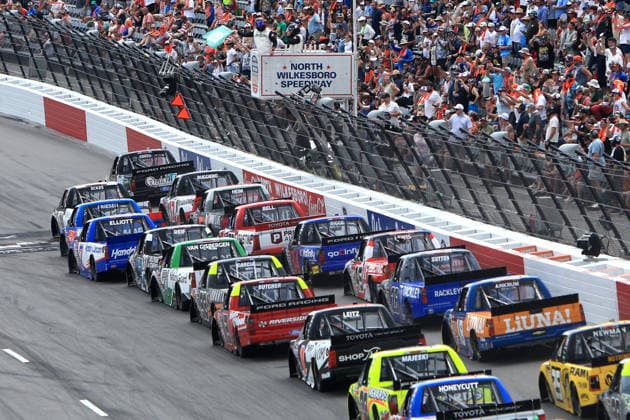NORTH WILKESBORO, NC - JULY 18: Chandler Smith ( 38 Front Row Motorsports QuickTie Ford) leads the field to a restart during the running of the NASCAR, Motorsport, USA Craftsman Truck Series FaithFest 250 on July 18, 2026 at North Wilkesboro Speedway in North Wilkesboro, NC. (Photo by Jeff Robinson Icon Sportswire) AUTO: JUL 18 NASCAR CRAFTSMAN Truck Series Faith Fest 250 EDITORIAL USE ONLY Icon26071825006250