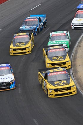 NORTH WILKESBORO, NC - JULY 18: Ryan Newman ( 25 Kaulig Racing RAM) leads Mini Tyrrell ( 14 Kaulig Racing RAM) and Justin Haley ( 16 Kaulig Racing RAM) in turn 4 during the running of the NASCAR, Motorsport, USA Craftsman Truck Series FaithFest 250 on July 18, 2026 at North Wilkesboro Speedway in North Wilkesboro, NC. (Photo by Jeff Robinson Icon Sportswire) AUTO: JUL 18 NASCAR CRAFTSMAN Truck Series Faith Fest 250 EDITORIAL USE ONLY Icon26071825089250