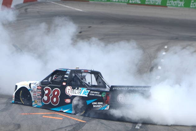 NORTH WILKESBORO, NC - JULY 18: Chandler Smith ( 38 Front Row Motorsports QuickTie Ford) celebrates after winning the NASCAR, Motorsport, USA Craftsman Truck Series FaithFest 250 on July 18, 2026 at North Wilkesboro Speedway in North Wilkesboro, NC. (Photo by Jeff Robinson Icon Sportswire) AUTO: JUL 18 NASCAR CRAFTSMAN Truck Series Faith Fest 250 EDITORIAL USE ONLY Icon26071826022250