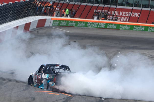 NORTH WILKESBORO, NC - JULY 18: Chandler Smith ( 38 Front Row Motorsports QuickTie Ford) celebrates after winning the NASCAR, Motorsport, USA Craftsman Truck Series FaithFest 250 on July 18, 2026 at North Wilkesboro Speedway in North Wilkesboro, NC. (Photo by Jeff Robinson Icon Sportswire) AUTO: JUL 18 NASCAR CRAFTSMAN Truck Series Faith Fest 250 EDITORIAL USE ONLY Icon26071826028250