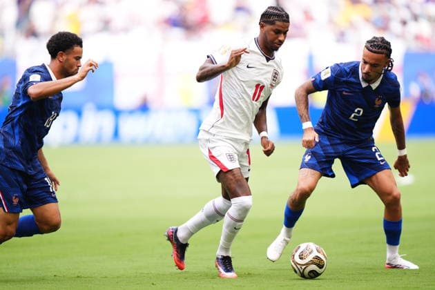 France v England - 2026 FIFA World Cup, WM, Weltmeisterschaft, Fussball - Bronze Final MIAMI GARDENS, FLORIDA - JULY 18: Marcus Rashford (11) of England Warren Zaire-Emery and Malo Gusto of France compete for the ball during the 2026 FIFA World Cup bronze-final match between France and England at Miami Stadium in Miami Gardens, Florida, United States, on July 18, 2026. Jose Hernandez Anadolu Florida United States. Editorial use only. Please get in touch for any other usage.  Copyright: x2026xAnadoluxJosexHernandezx
