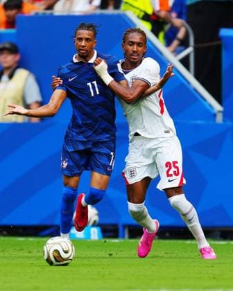 Michael Olise of France appeals for a foul whist being challenged by Djed Spence of England France v England, 2026 FIFA World Cup, WM, Weltmeisterschaft, Fussball 3rd Place Final, Football, Miami Stadium, Miami, Florida, USA - 18 Jul 2026Miami Miami Stadium Florida (FL) United States of America  Copyright: xJavierxGarcia Shutterstockx 16995468am