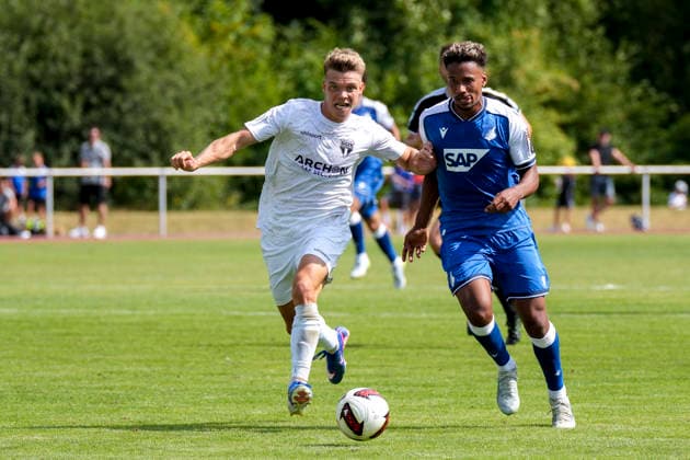 v.li.: Tino Bradara (SGV, 2), Bambase Conte (Hoffenheim, 20), Zweikampf, Spielszene, Duell, duel, tackle, tackling, Dynamik, Action, Aktion, 18.07.2026, Bad Friedrichshall (Deutschland), Fussball, Testspiel, TSG 1899 Hoffenheim - SGV Heilbronn-Freiberg, DFB DFL REGULATIONS PROHIBIT ANY USE OF PHOTOGRAPHS AS IMAGE SEQUENCES AND OR QUASI-VIDEO. *** From left: Tino Bradara (SGV), 2; Bambase Conte (Hoffenheim), 20; tackle, game scene, duel, tackle, tackling, dynamism, action, July 18, 2026, Bad Friedrichshall, Germany, soccer, exhibition match, TSG 1899 Hoffenheim vs. SGV Heilbronn Freiberg, DFB and DFL regulations prohibit any use of photographs as image sequences and or quasi-video xozx