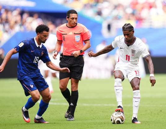 France v England - 2026 FIFA World Cup, WM, Weltmeisterschaft, Fussball - Bronze Final MIAMI GARDENS, FLORIDA - JULY 18: Marcus Rashford of England and Warren Zaire-Emery of France compete for the ball during the 2026 FIFA World Cup bronze-final match between France and England at Miami Stadium in Miami Gardens, Florida, United States, on July 18, 2026. Jose Hernandez Anadolu Florida United States. Editorial use only. Please get in touch for any other usage.  Copyright: x2026xAnadoluxJosexHernandezx