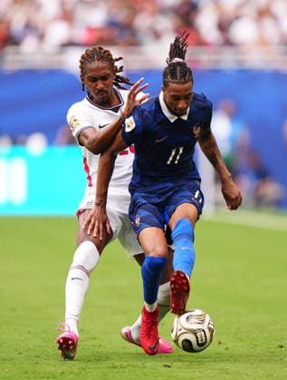 France v England - 2026 FIFA World Cup, WM, Weltmeisterschaft, Fussball - Bronze Final MIAMI GARDENS, FLORIDA - JULY 18: Michael Olise of France and Djed Spence of England compete for the ball during the 2026 FIFA World Cup bronze-final match between France and England at Miami Stadium in Miami Gardens, Florida, United States, on July 18, 2026. Jose Hernandez Anadolu Florida United States. Editorial use only. Please get in touch for any other usage.  Copyright: x2026xAnadoluxJosexHernandezx