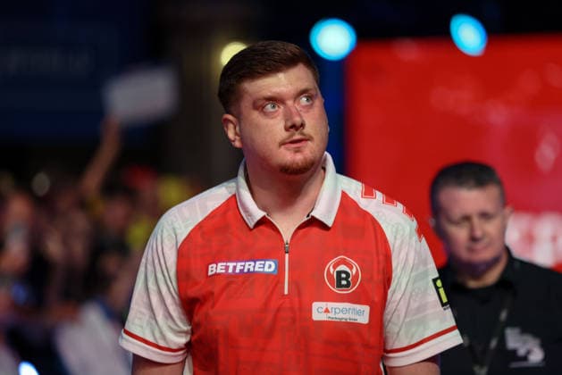 RECORD DATE NOT STATED 18th July 2026, Winter Gardens, Blackpool, Lancashire, England; 2026 Betfred World Matchplay Darts, Day One; Niko Springer during his walk on AidanxHunter