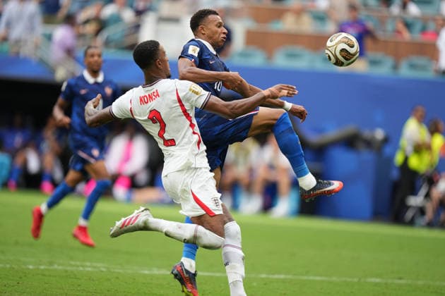 MIAMI GARDENS, FL - JULY 18: France forward Kylian MbappÃ (10) attacks with the ball as England defender Ezri Konsa (2) defends in the second half during the FIFA World Cup, WM, Weltmeisterschaft, Fussball 26 Bronze Final between France and England on Saturday, July 18, 2206 at Miami Stadium in Miami Gardens, FL (Photo by Peter Joneleit Icon Sportswire) SOCCER: JUL 18 FIFA World Cup 26 Bronze Final - France v England EDITORIAL USE ONLY Icon260718027