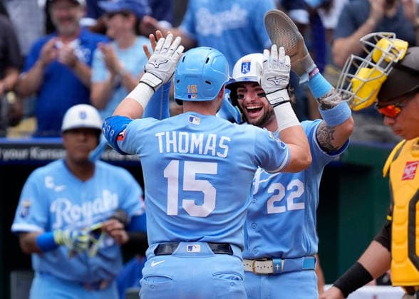 July 18, 2026, Kansas City, Missouri, USA: Kansas City Royals catcher CARTER JENSEN (22) congratulates Kansas City Royals center fielder LANE THOMAS (15) after his home run in the 1st inning against the Padres at Kauffman Stadium in Kansas City. Kansas City USA - ZUMAc04_ 20260718_zma_c04_003 Copyright: xJonxRobichaudx